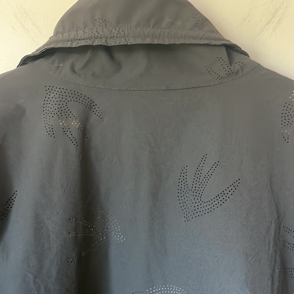 Nanette Lepore nylon perforation jacket with adjustable sleeve size Xl. - Picture 8 of 11